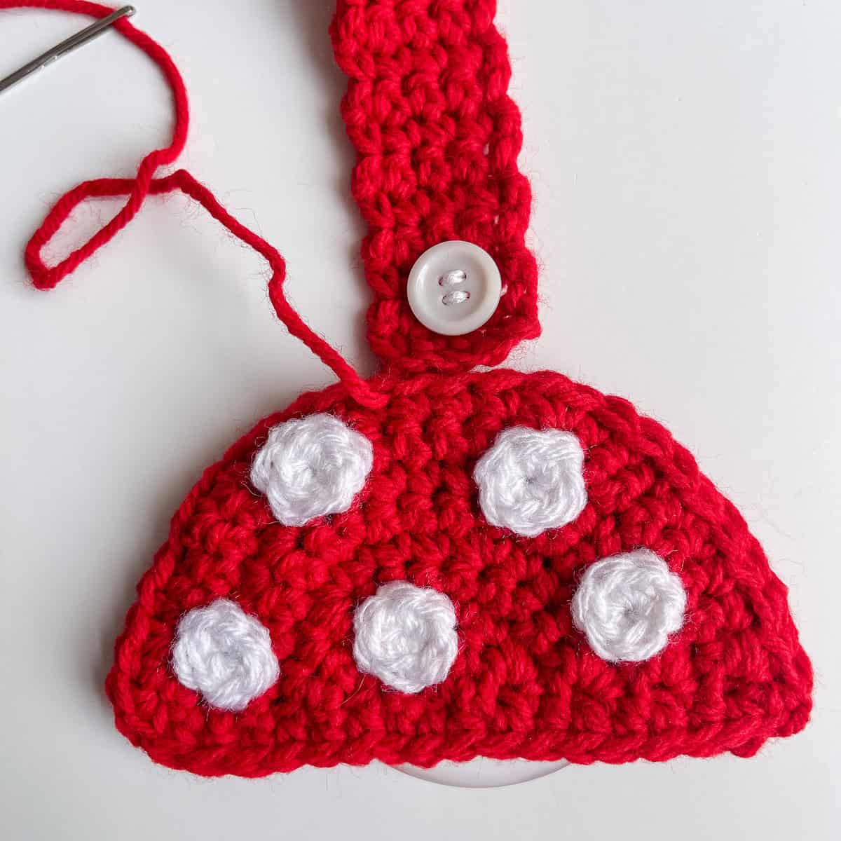 attach hanging tab to towel topper