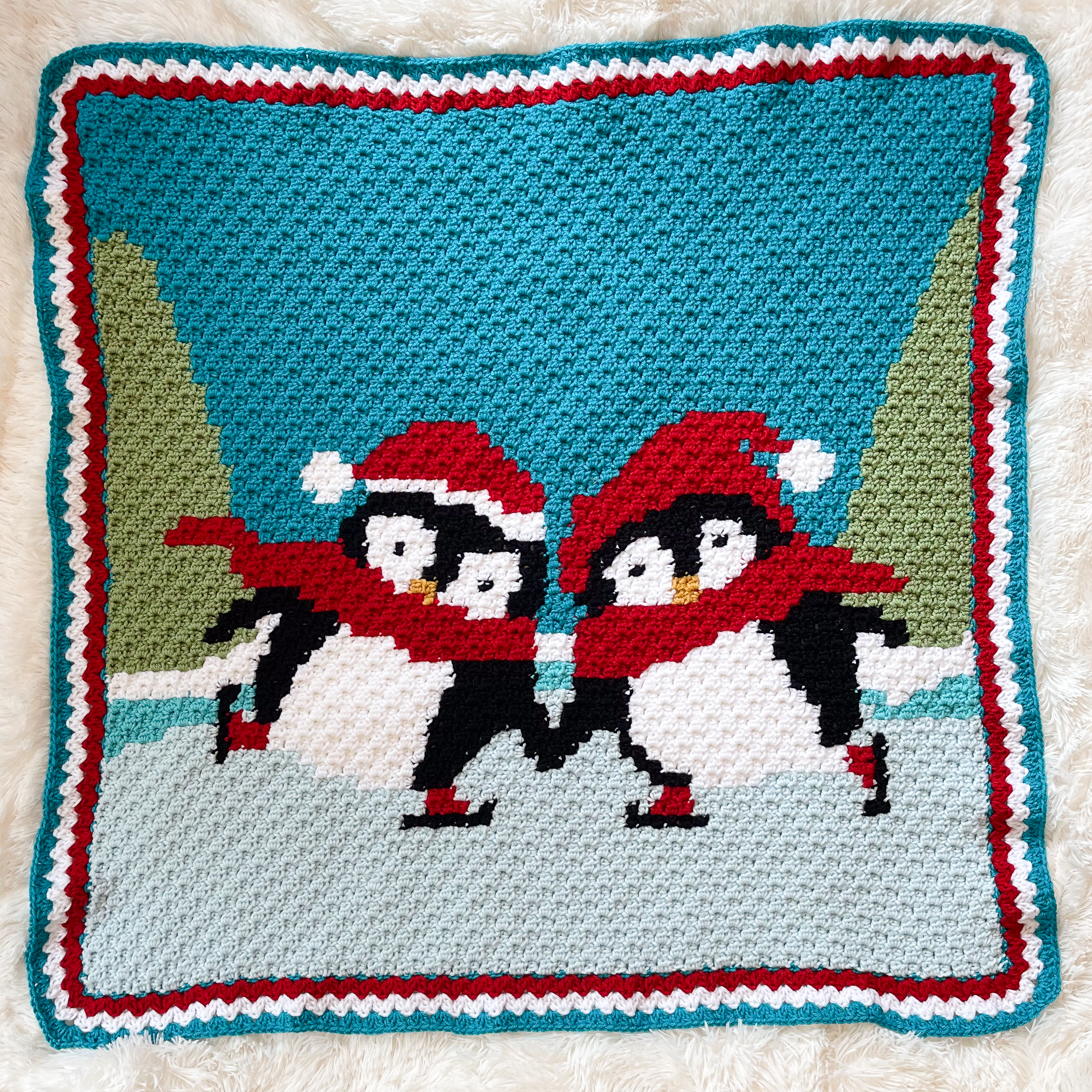 Crochet Penguin Skating in winter blanket