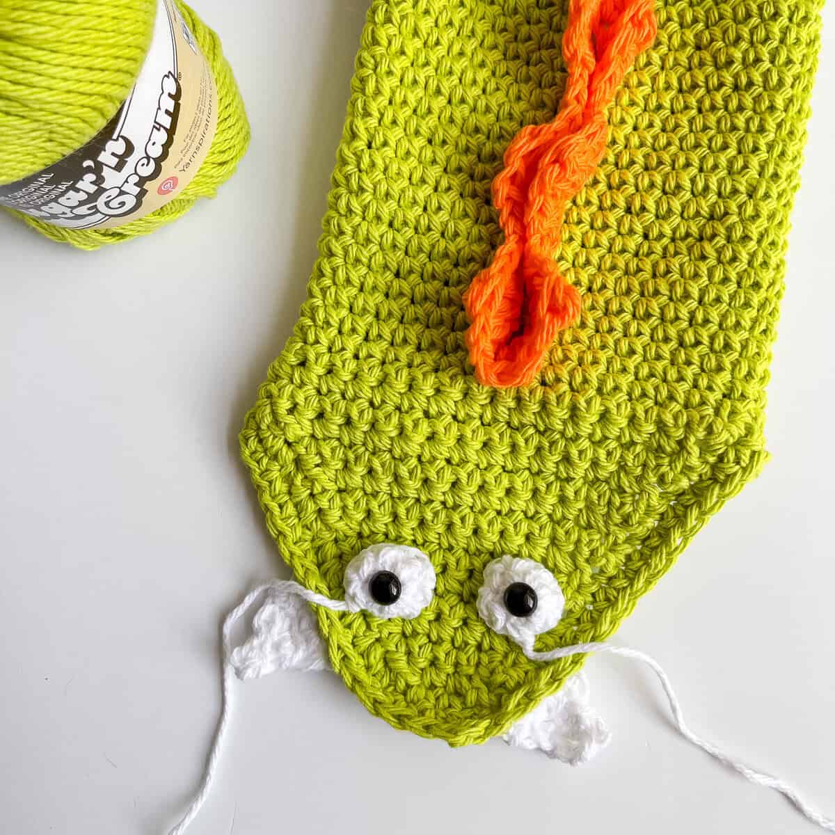 monster bottle holder sewing on eyes