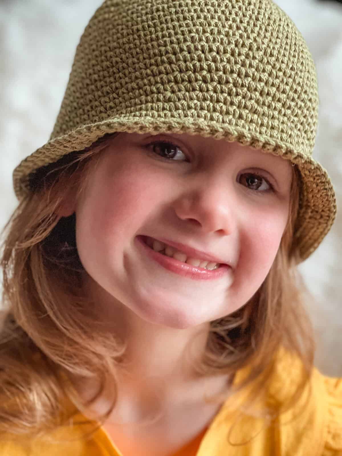 Crochet bucket hat for kids, perfect for sunny days and outdoor activities.