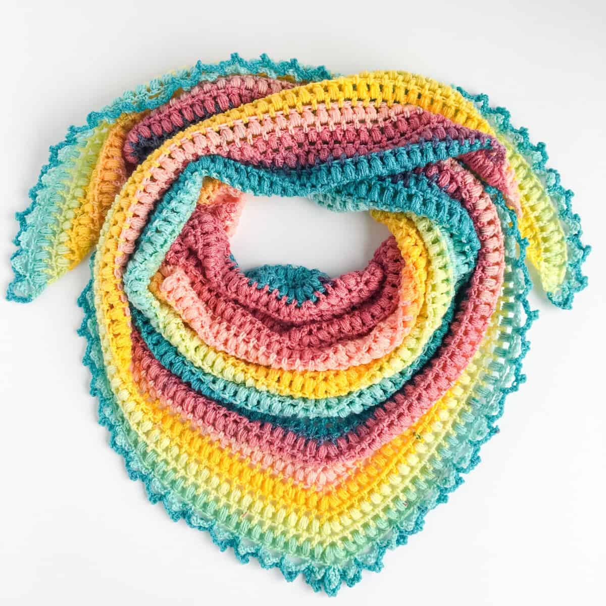 crochet triangle scarf with puff stitches